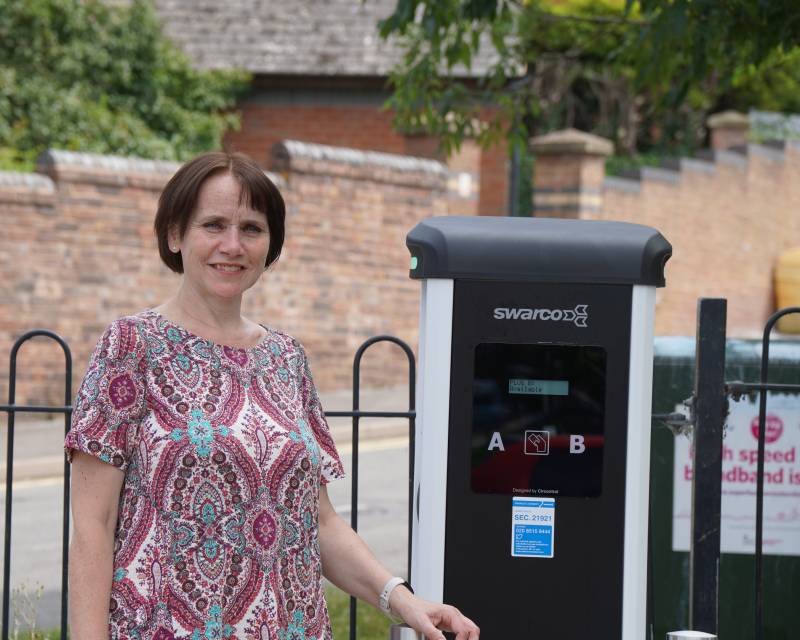 Cllr Zoe Cookson with one of the new EV charges in Tallow Hill car park