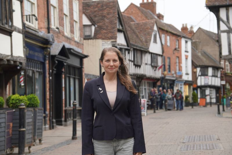 Councillor Hannah Cooper, Vice Chair of Worcester City Council’s Place and Economic Development Committee outside shops in Worcester
