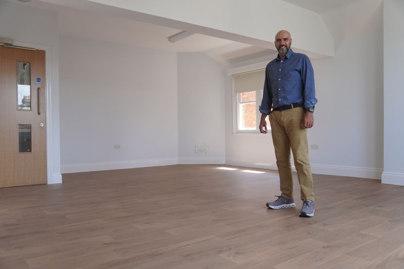 Councillor Jabba Riaz in the new community room at Comer Gardens Community Hall