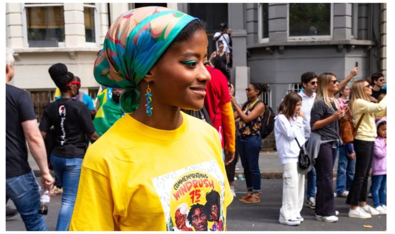 Woman in Windrush t-shirt