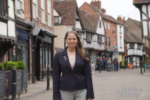 Councillor Hannah Cooper, Vice Chair of Worcester City Council’s Place and Economic Development Committee outside shops in Worcester