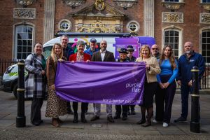 Representatives from Purple Flag partners Worcester Business Improvement District (Worcester BID), Worcester City Council, West Mercia Police, Worcester Street Pastors and Worcestershire Regulatory Services outside the Guildhall in Worcester