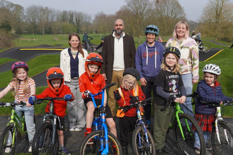 At the opening of the new pump track at Perdiswell Leisure Centre are (back l-r) Councillor Hannah Cooper, Vice Chair of Worcester City Council’s Place & Economic Development Committee; Councillor Jabba Riaz, Deputy Leader of Worcester City Council; Tracey Moseley, former downhill and enduro mountain bike world champion; Councillor Katie Collier, Worcester City Council’s champion for children and young people. Along with children from North Worcester Primary Academy who attended the opening