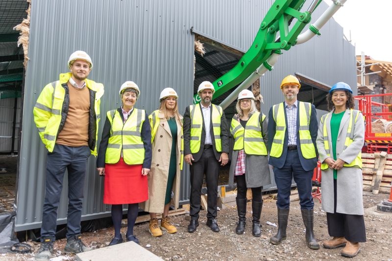 Standing outside the building are (l-r): George Hall; Councillor Lynn Denham; Gemma Parsons; Councillor Jabba Riaz; Bridget Brickley; David Sutton; Claire Miller.