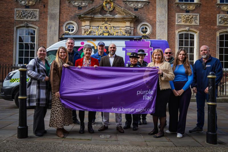 Representatives from Purple Flag partners Worcester Business Improvement District (Worcester BID), Worcester City Council, West Mercia Police, Worcester Street Pastors and Worcestershire Regulatory Services outside the Guildhall in Worcester