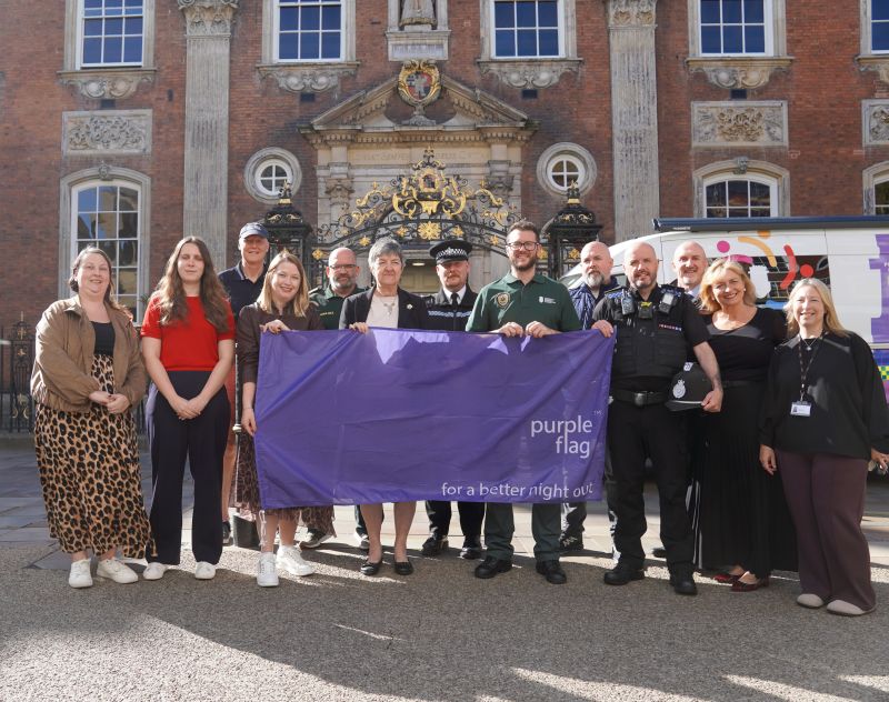 Representatives from Purple Flag partners